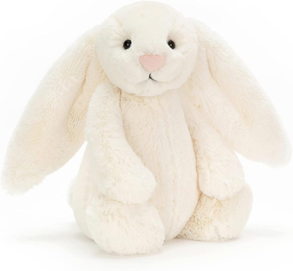 Bashful Bunny Jellycat review image featuring the soft plush bunny toy in festive setting.